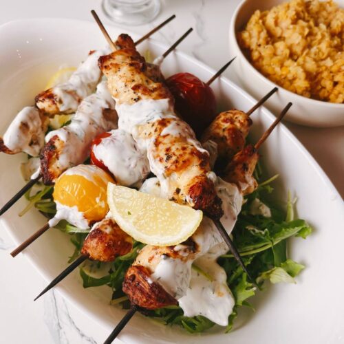 Juicy lemon and herb chicken skewers, golden brown and perfectly grilled, ready to serve
