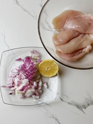 Raw chicken fillet pieces ready for marinating, fresh and tender cuts of chicken breast