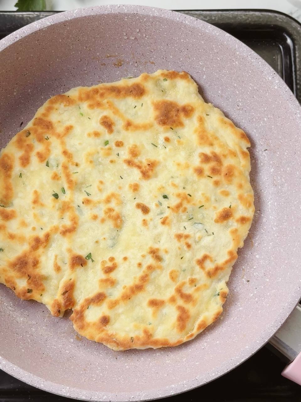 Garlic yogurt flatbread with golden brown side