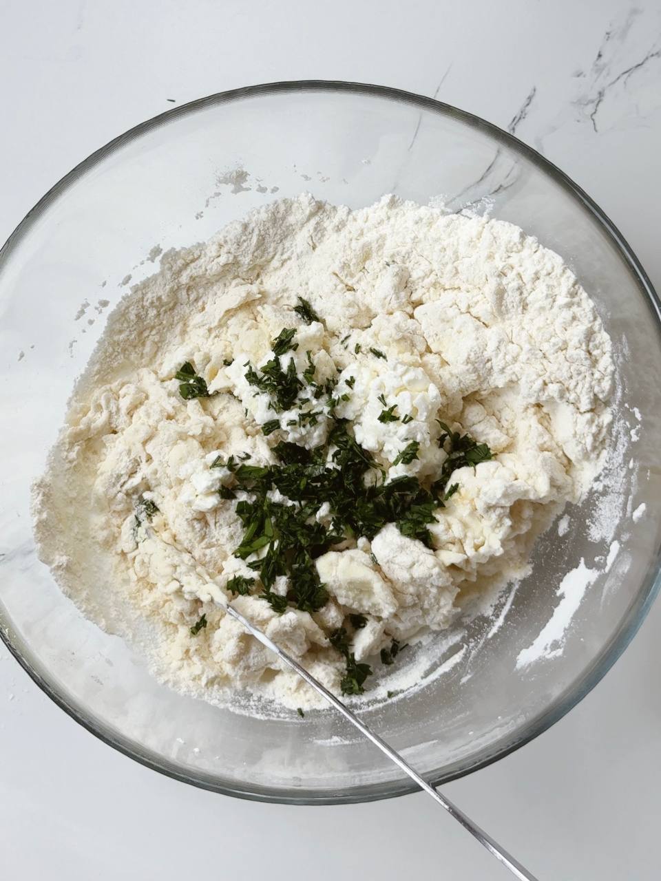 Mixing dough for garlic yogurt flatbread