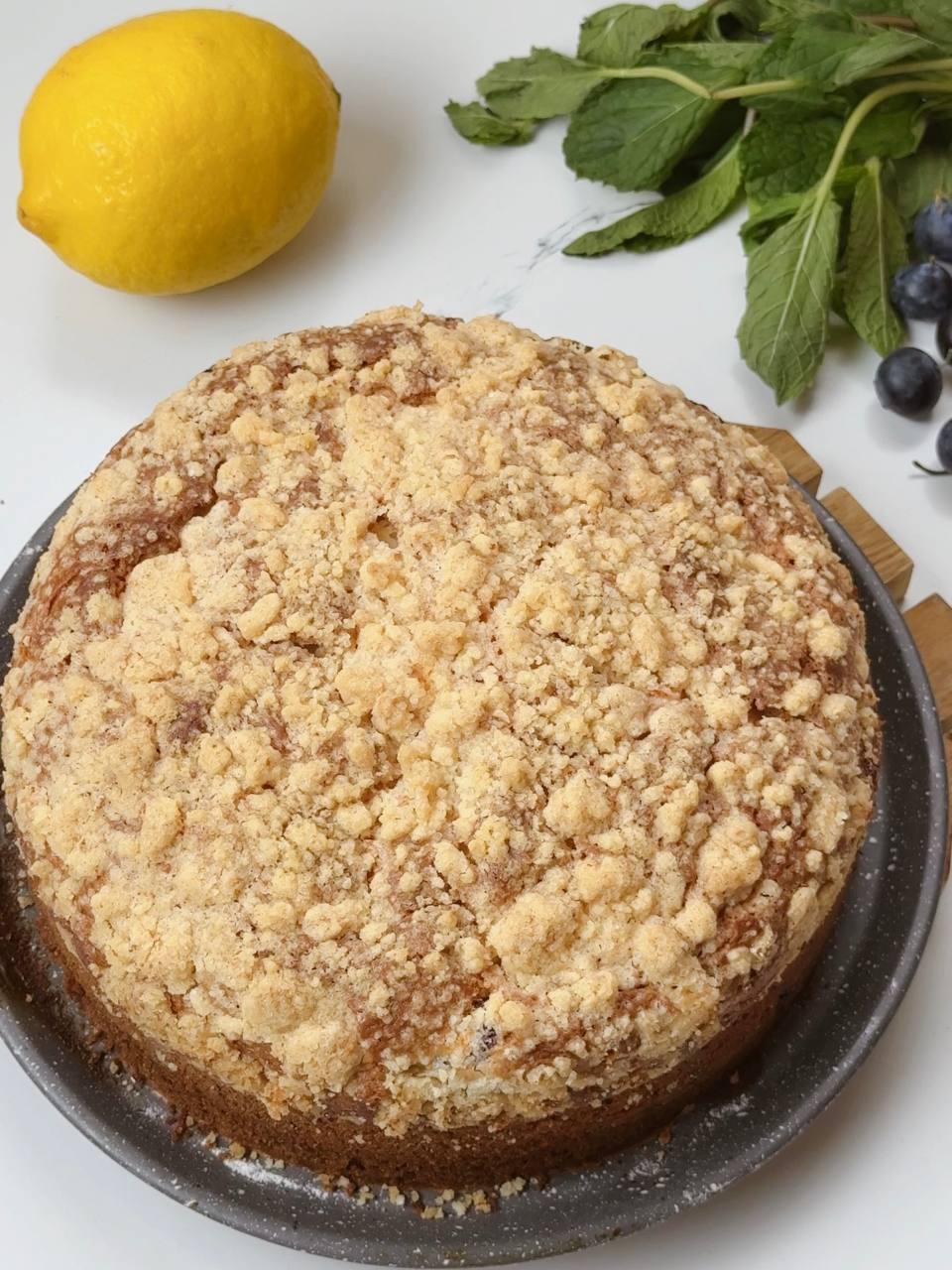 Freshly baked lemon yogurt cake with golden crumble