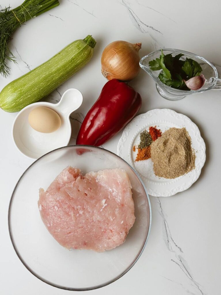 Ingredients for baked chicken and zucchini fritters