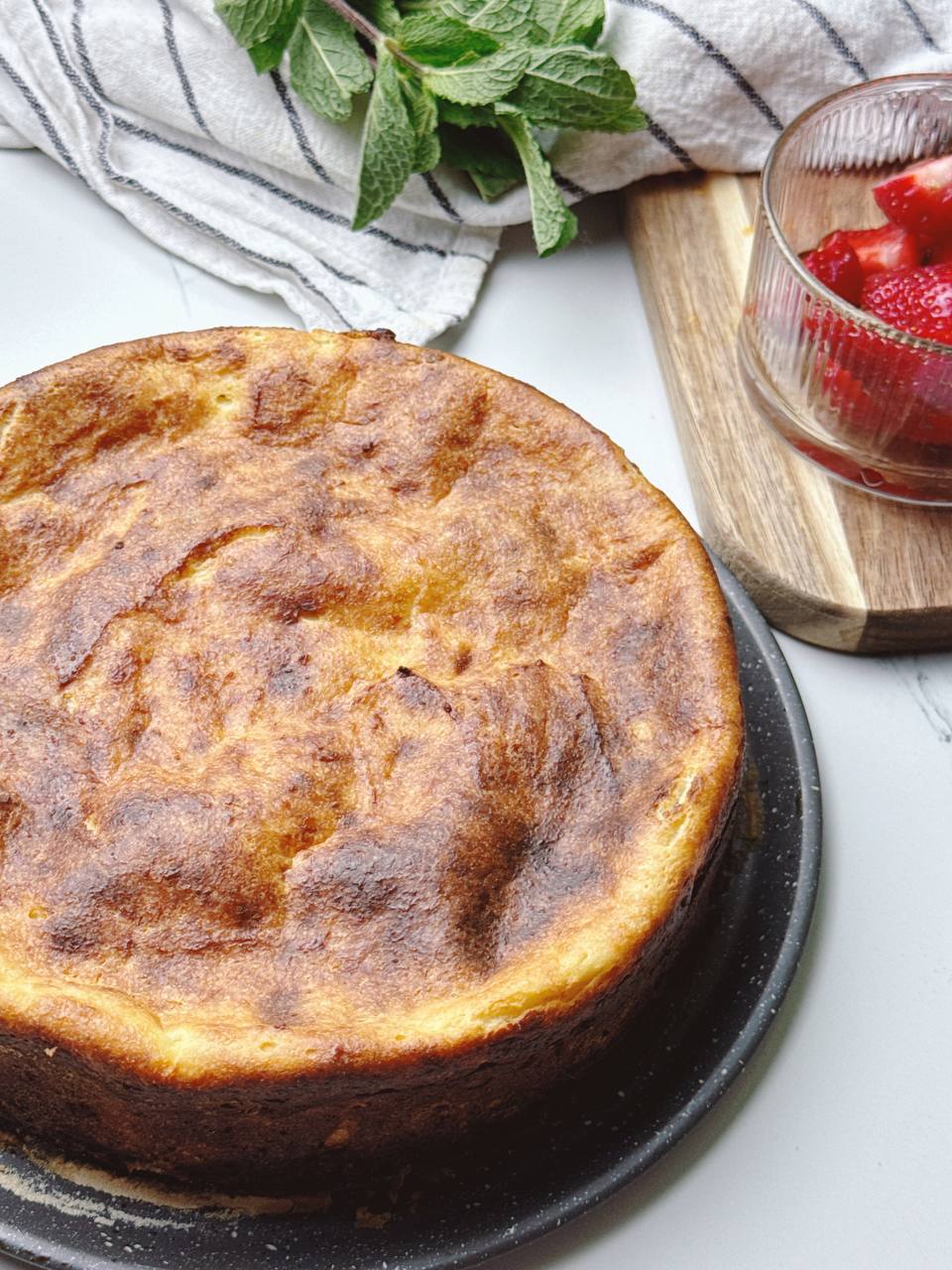 Freshly baked healthy cottage cheese dessert with golden top