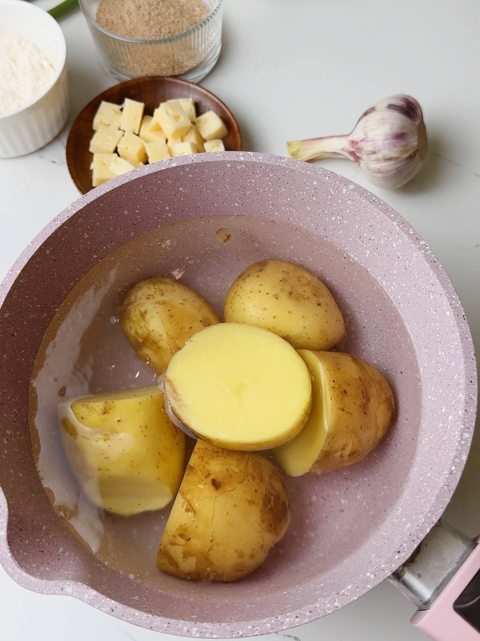 Cooking whole potatoes in boiling water