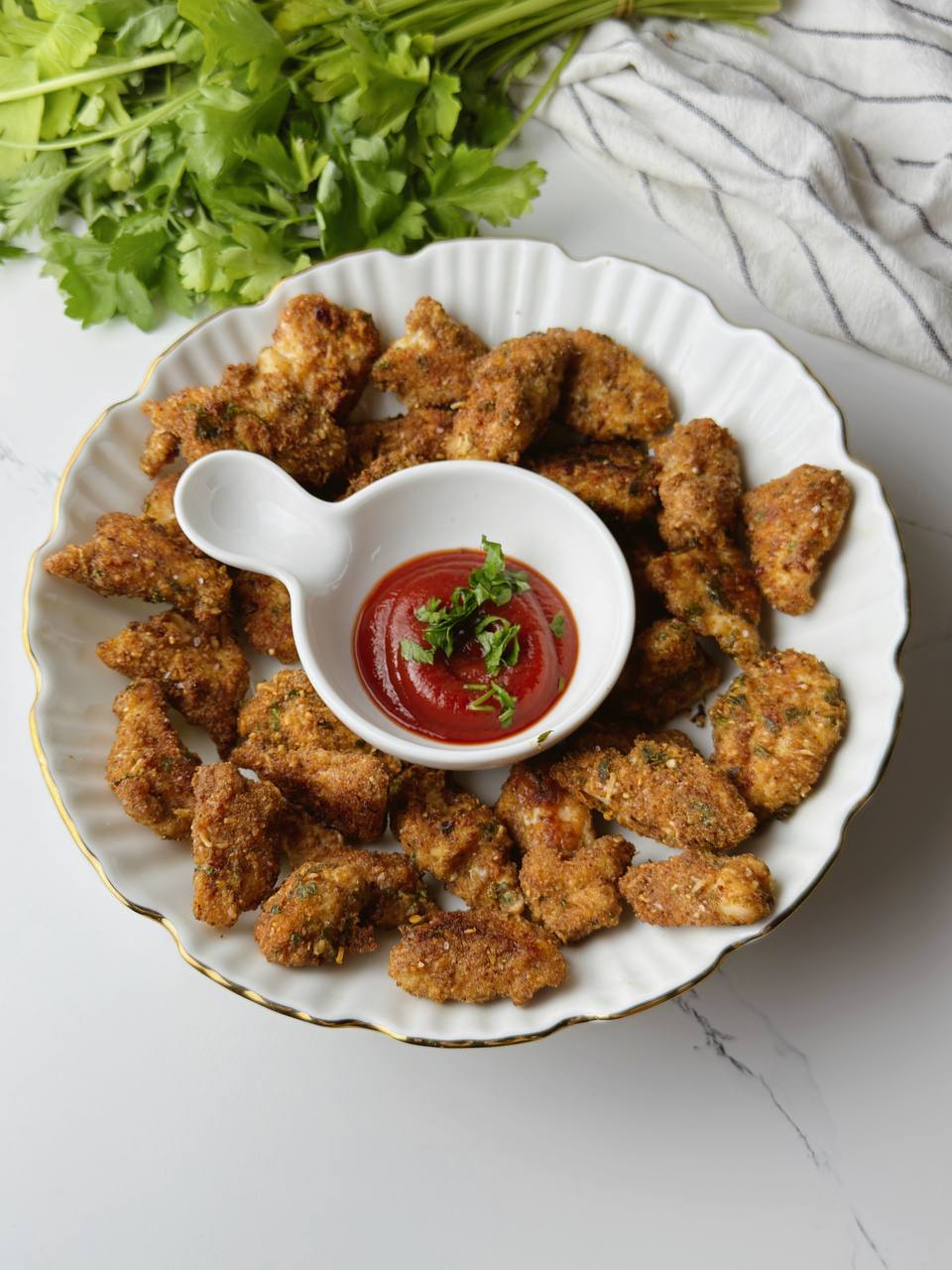 Crispy baked Chicken Parmesan Nuggets served on a plate