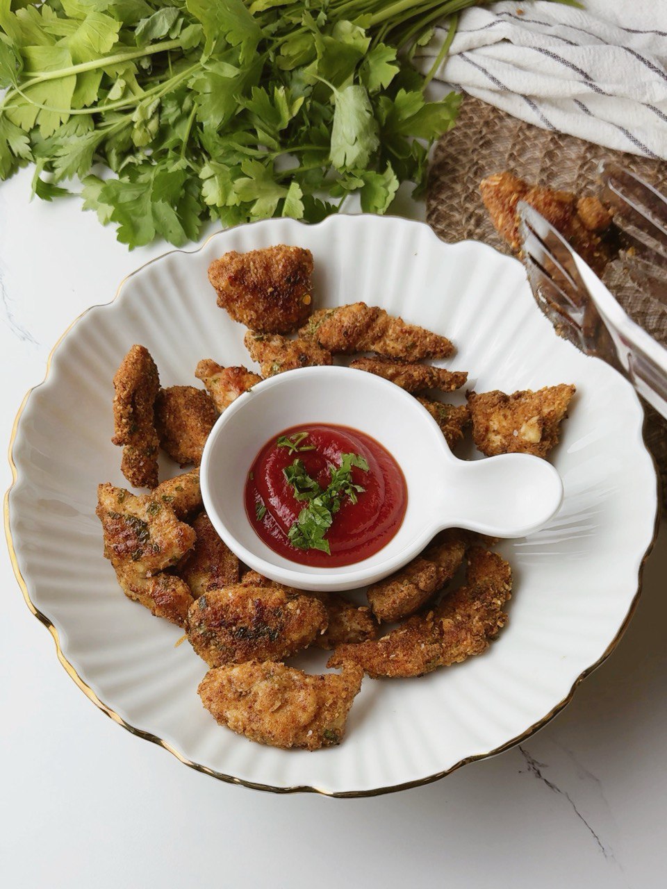 Serving crispy baked chicken nuggets with dipping sauce