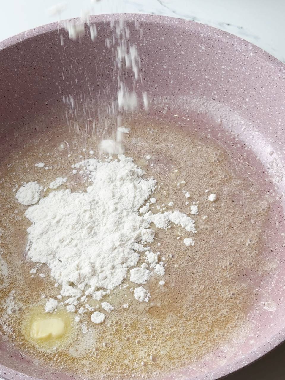 All-purpose flour stirred into melted butter to start the creamy sauce