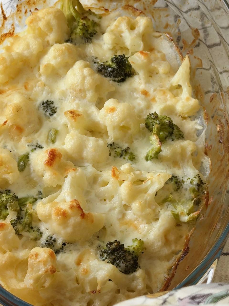 Broccoli and cauliflower gratin baked in the oven until golden.