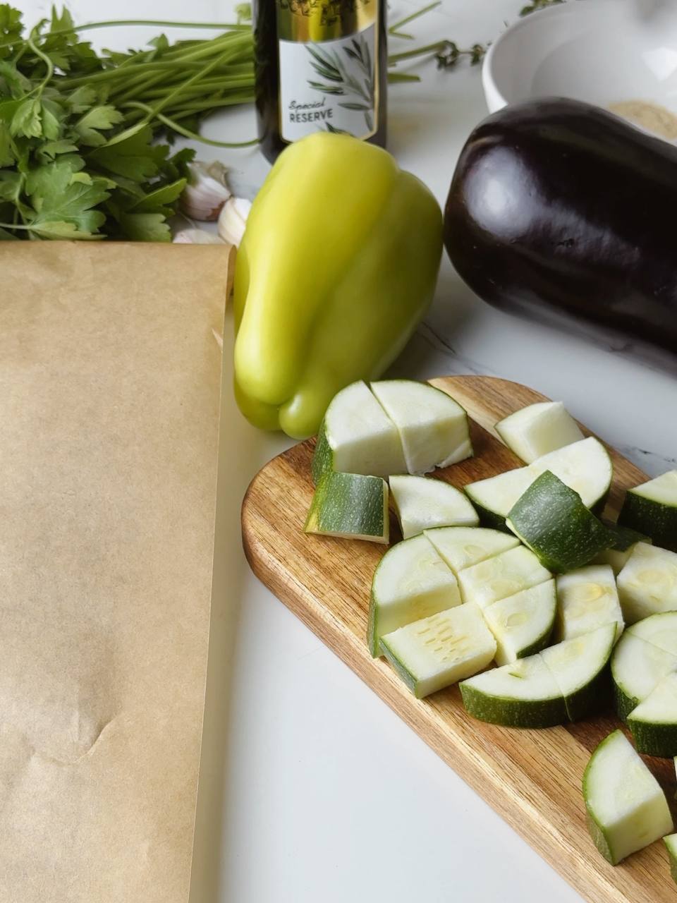 Freshly chopped cabbage on a wooden board, prepped for oven roasting.