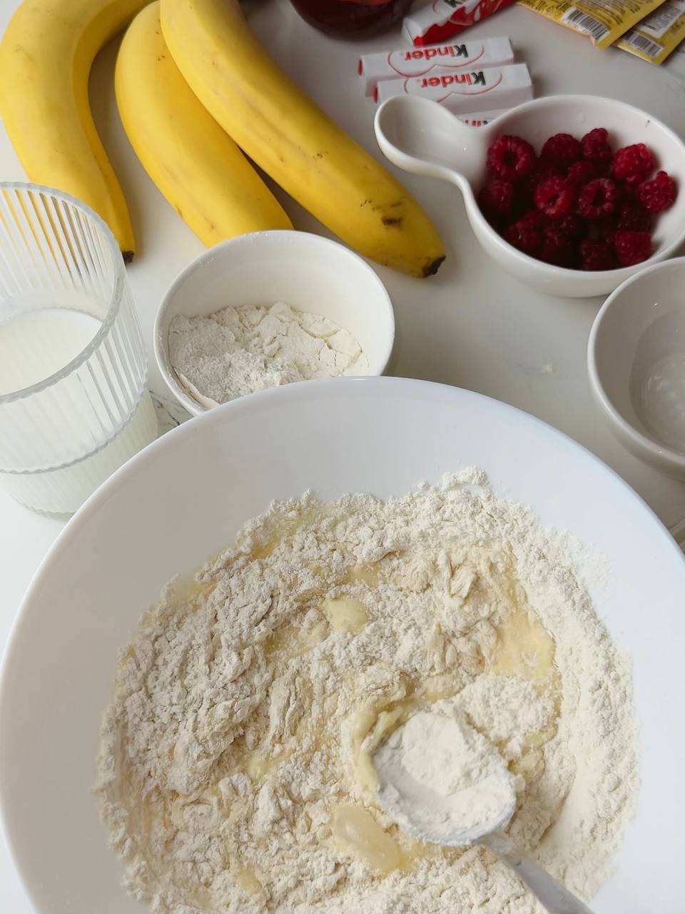 Whisking egg, sugar, flour and vanilla in a bowl for easy banana pancake batter