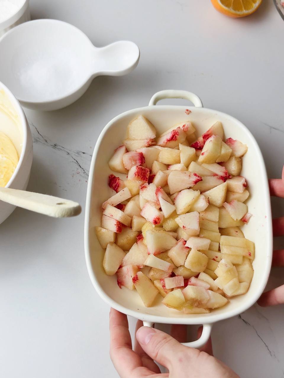Diced peaches tossed with lemon juice for the filling