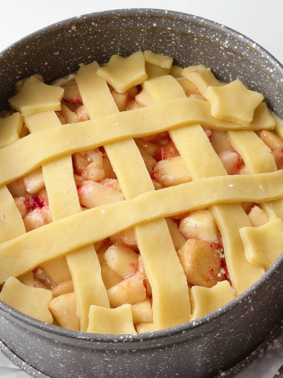 Peach pie assembled and ready to go into the oven