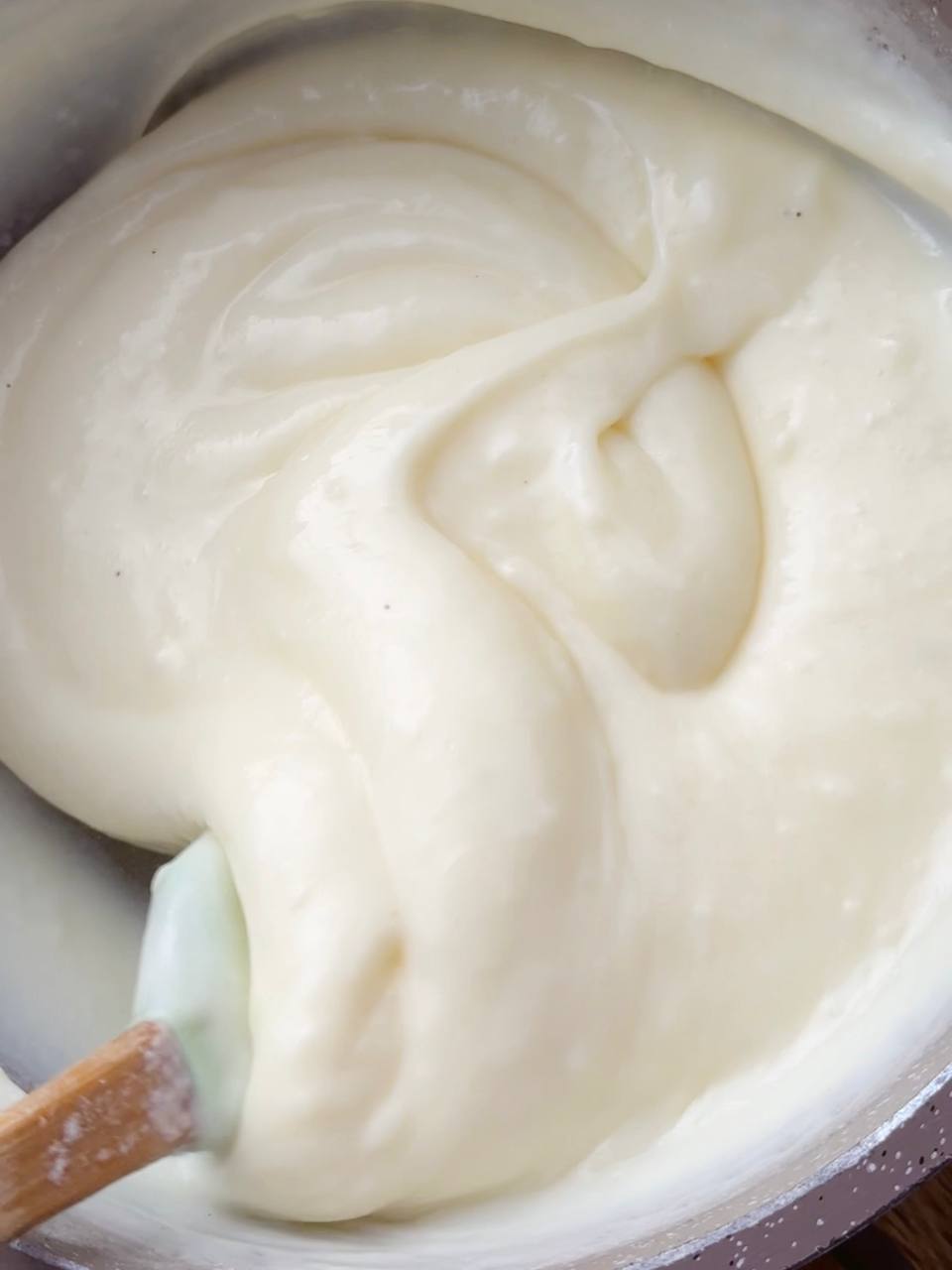 Cooking custard on the stove until thick and silky