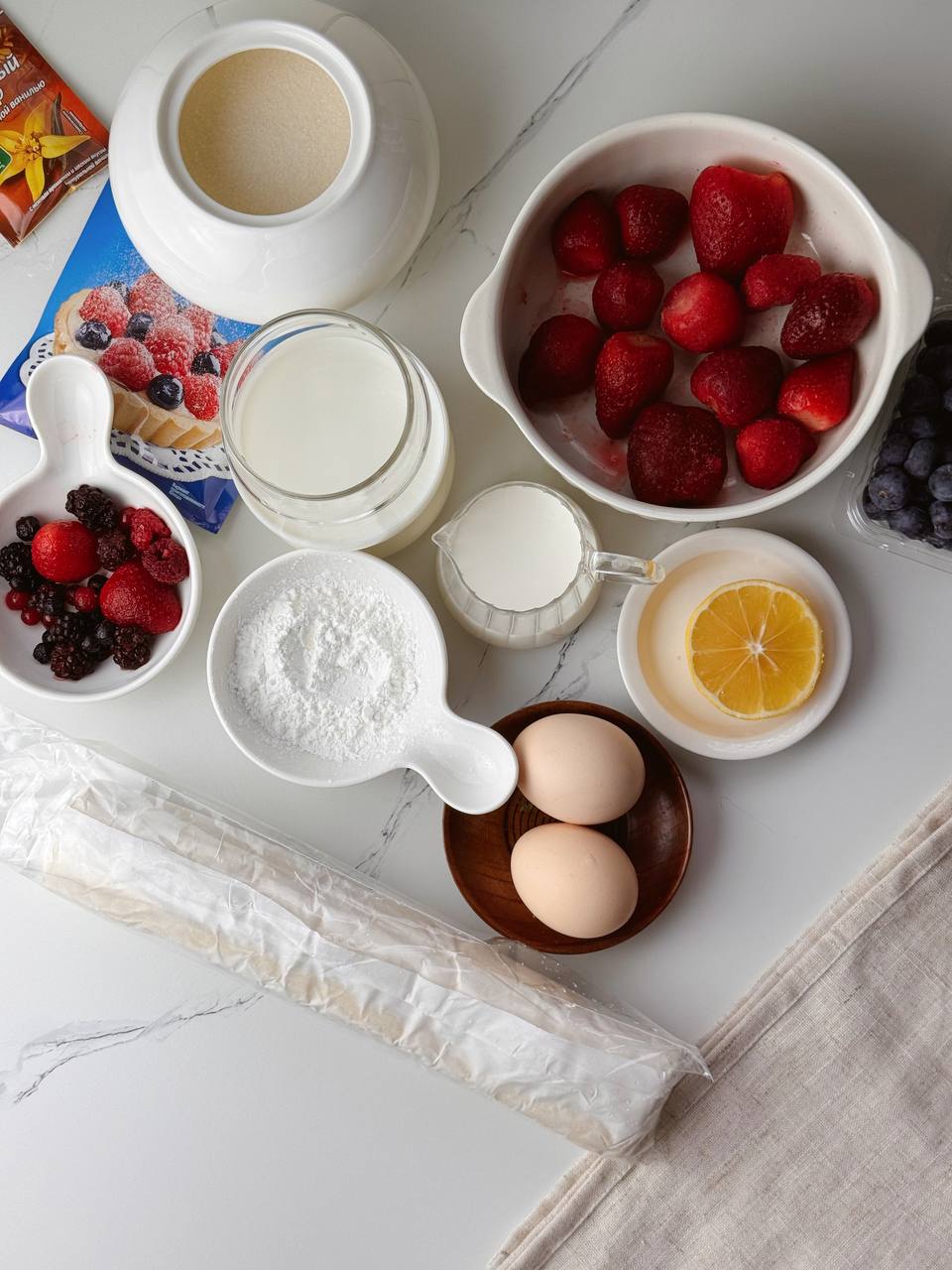 Ingredients for easy puff pastry hearts with custard and berry compote