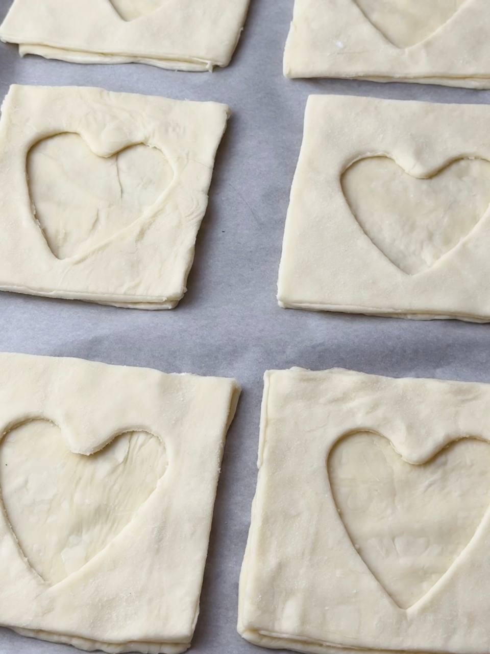 Shaped puff pastry hearts ready to bake