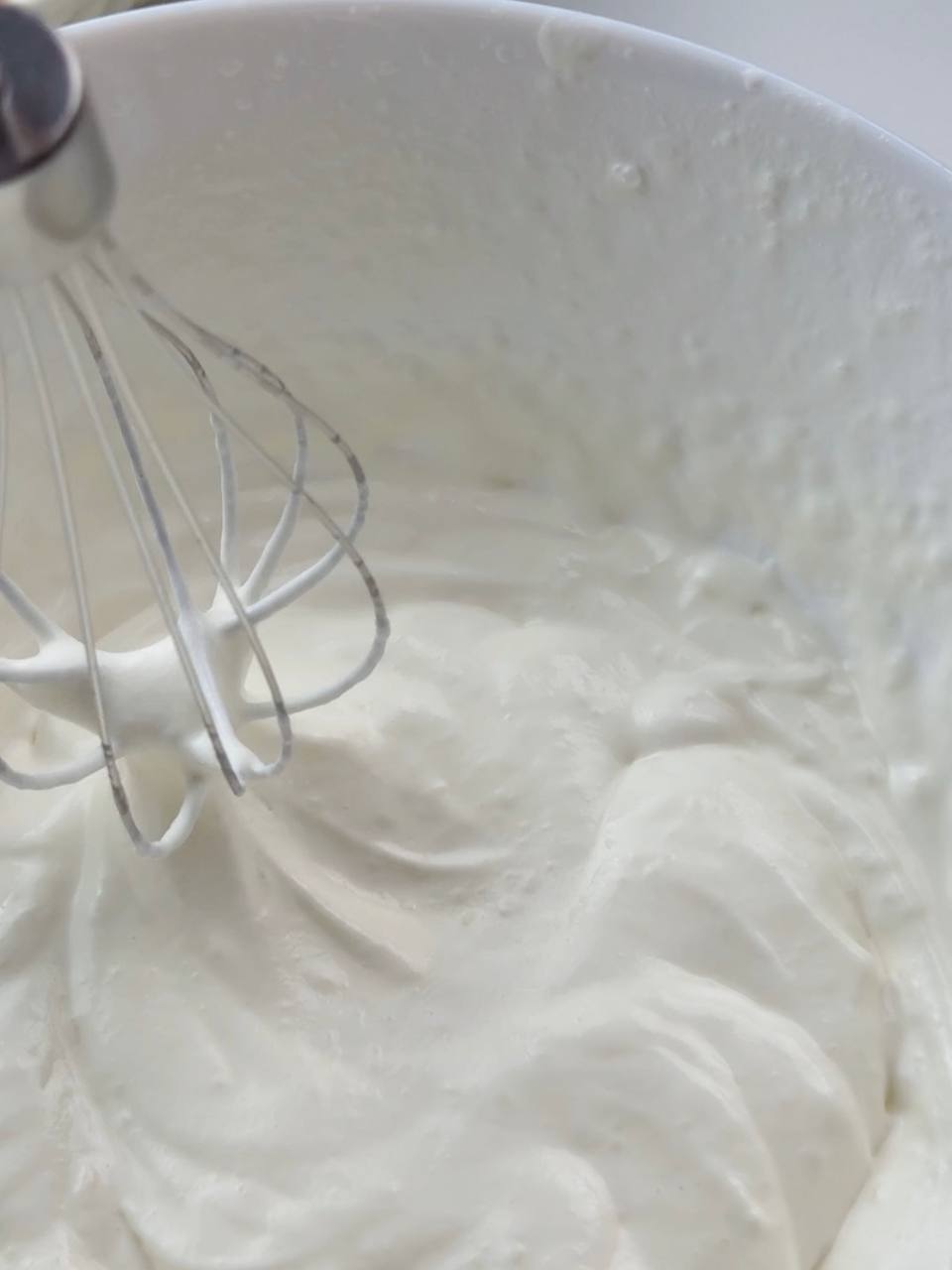 Whipping heavy cream for clementine tiramisu