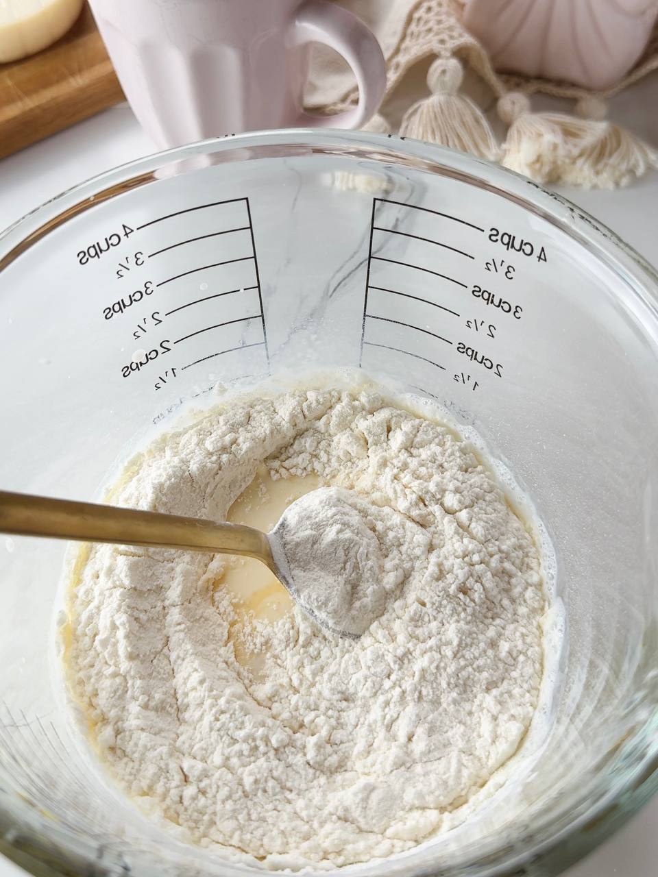 Adding flour to pancake batter for heart shaped pancakes