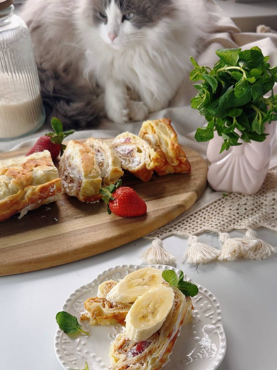 Sliced strawberry cream oven baked pancake roll