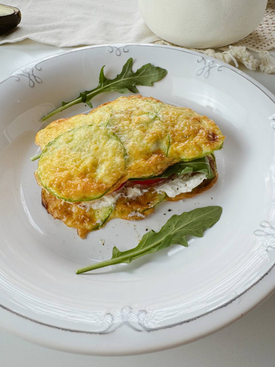 healthy baked zucchini breakfast sandwich with avocado ready to serve