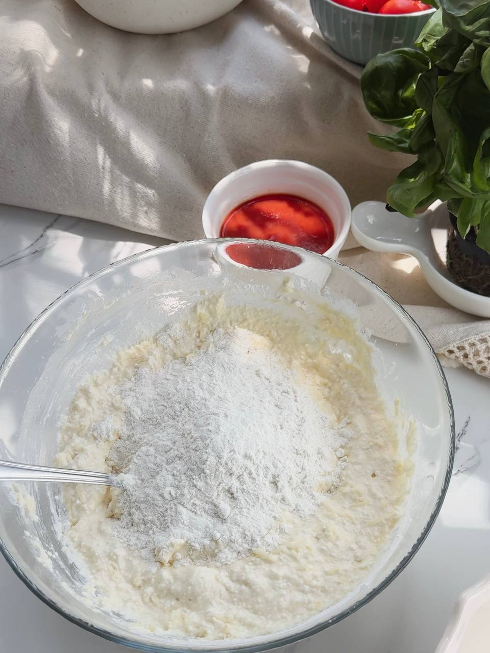 adding flour to cottage cheese pizza dough