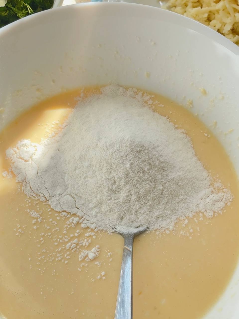 adding rice flour to the fritter batter
