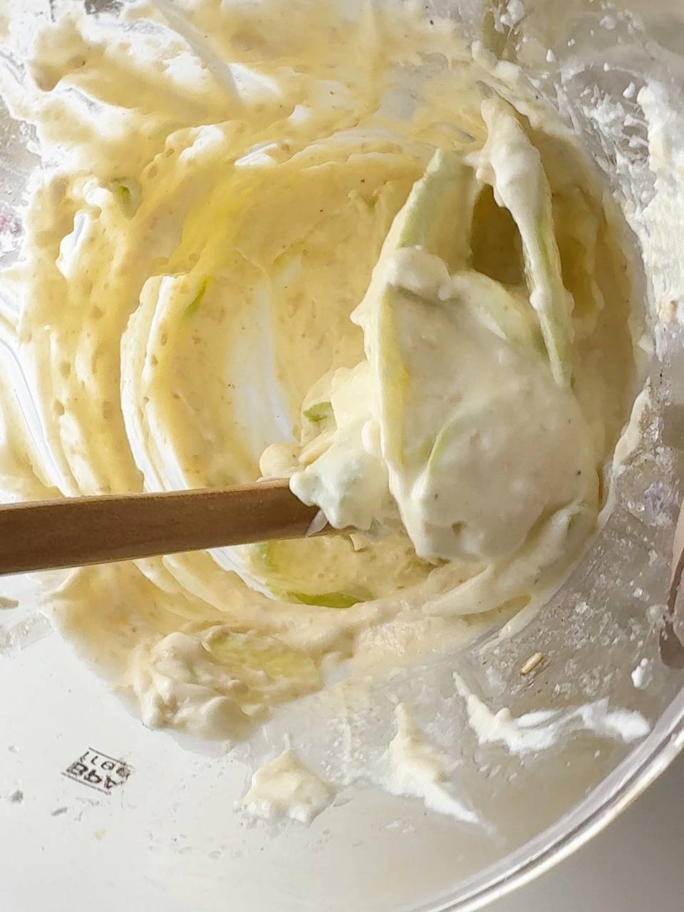 stirring grated apple into the cottage cheese and oat mixture