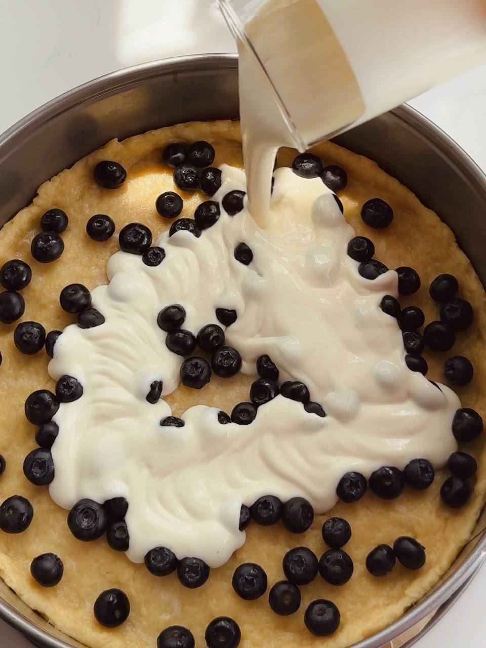 blueberries topped with cottage cheese filling before baking