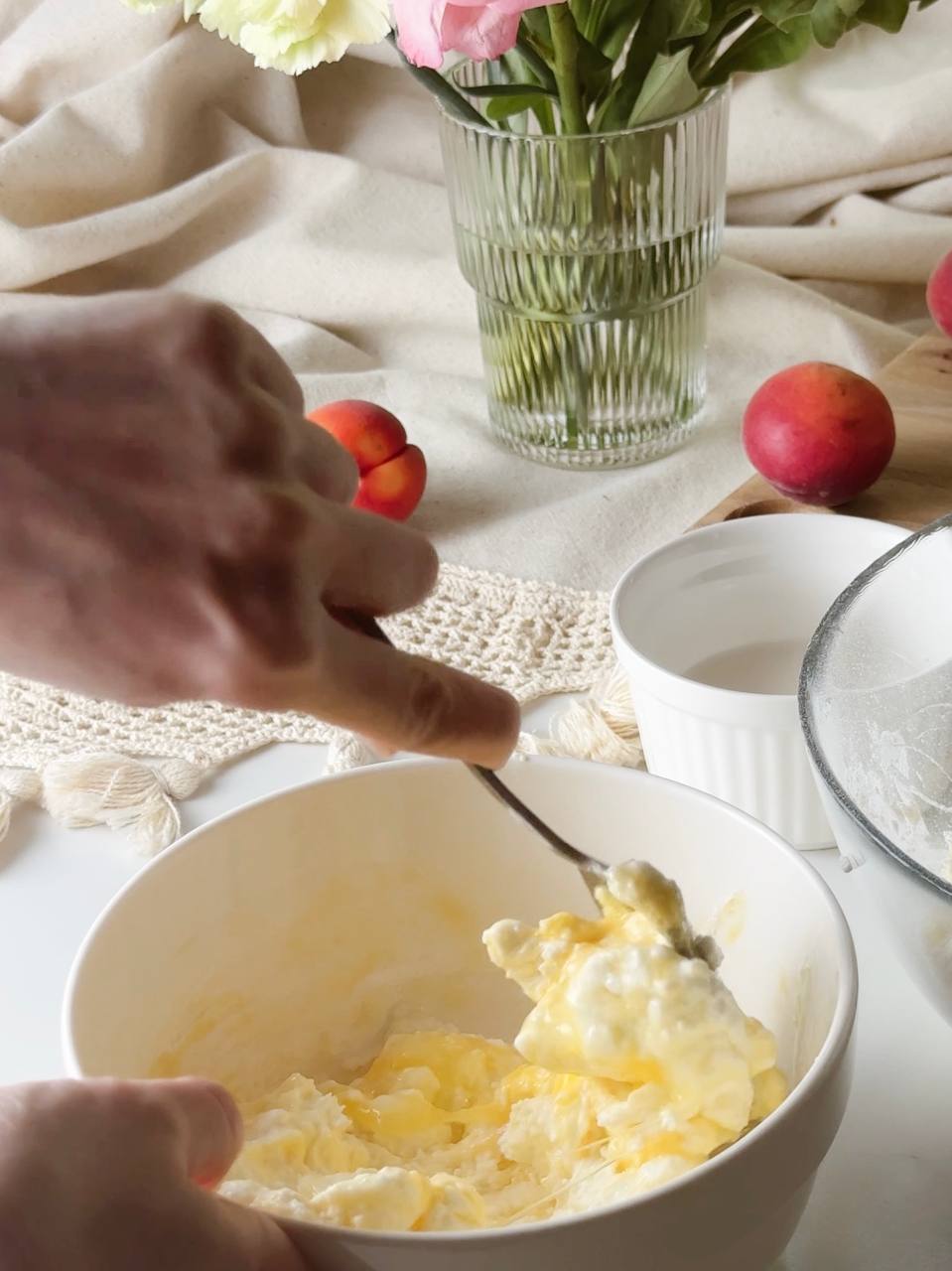 mixing cottage cheese and egg in a bowl