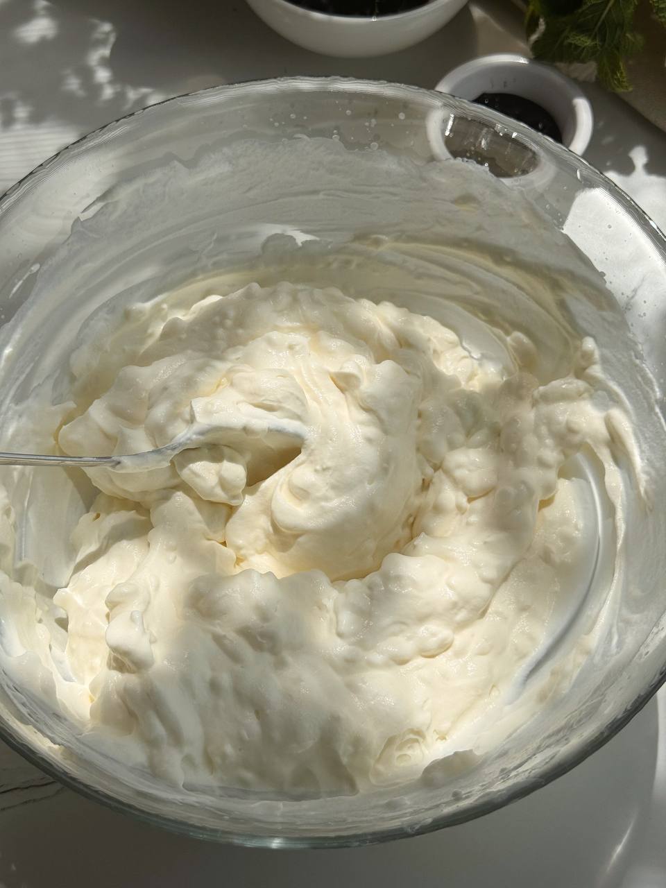 mixing whipped cream into the cottage cheese filling
