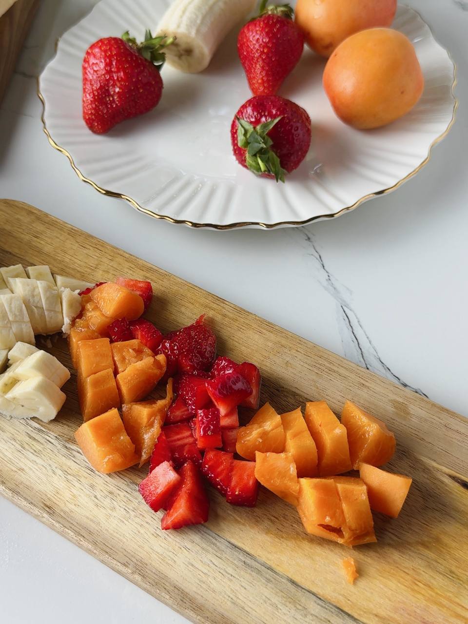 diced strawberries, banana, and apricots for the cottage cheese filling