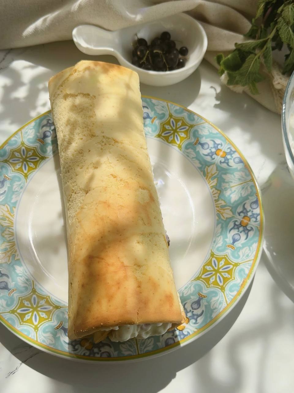 roll cake filled with cream before chilling