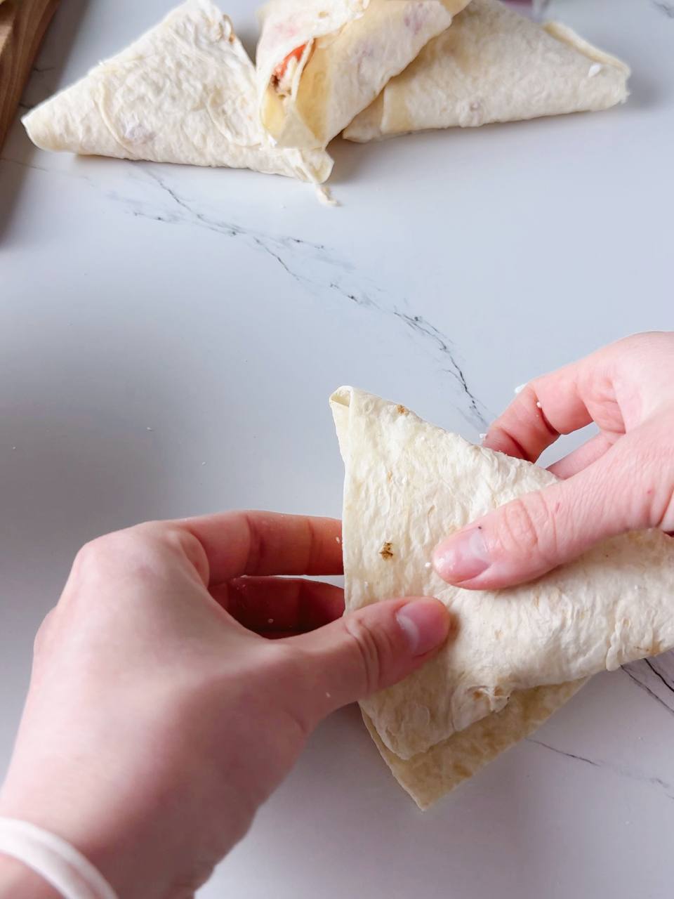 folded cottage cheese breakfast wrap ready for cooking