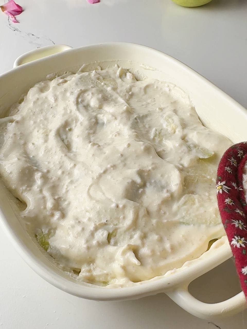 cottage cheese oatmeal bake mixture spread evenly in a baking dish before baking