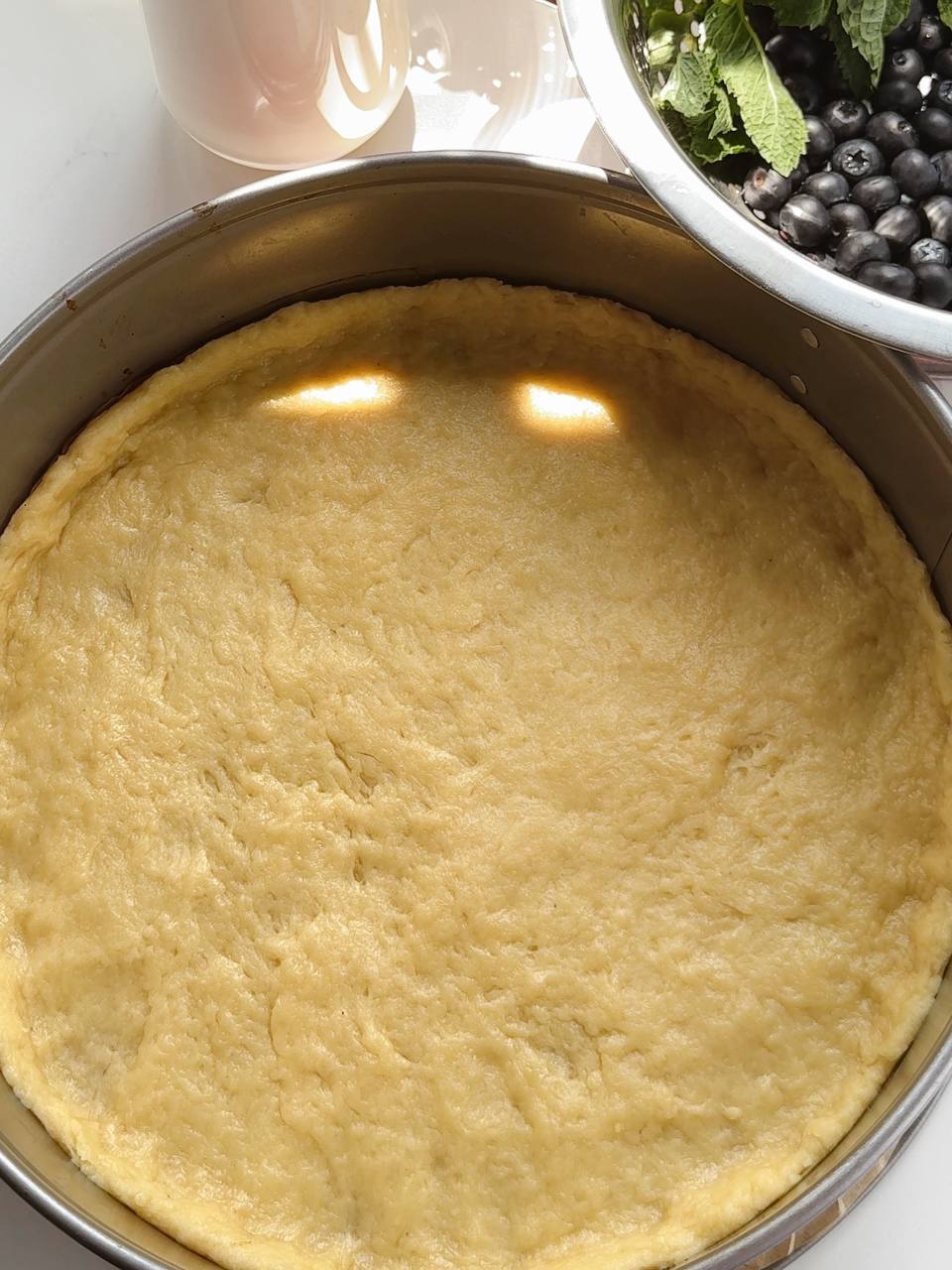 homemade pie crust pressed into a baking dish