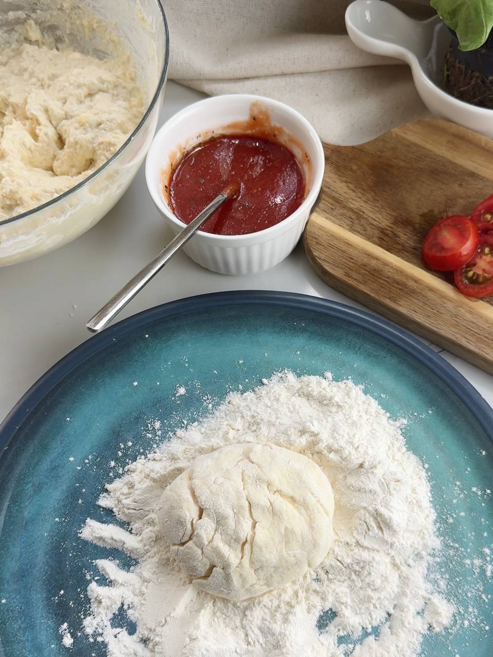 shaping cottage cheese dough into mini pizza rounds