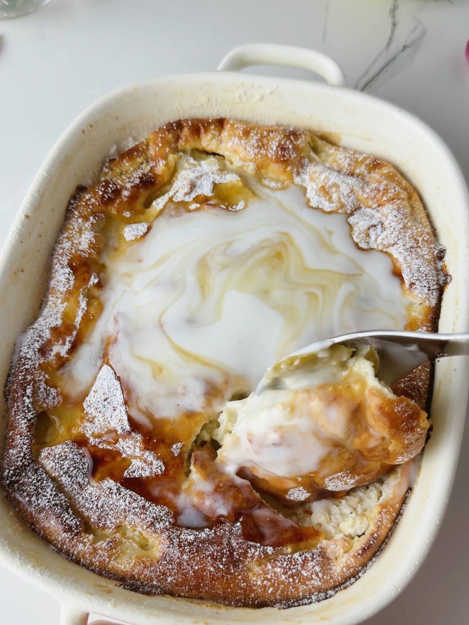 close up of a spoonful of apple cottage cheese oatmeal bake