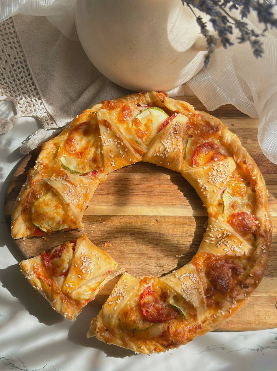 feasy zucchini puff pastry tart with mozzarella and tomatoes