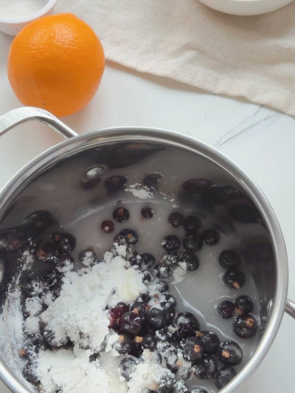 blackcurrants, sugar, cornstarch, and water in a saucepan