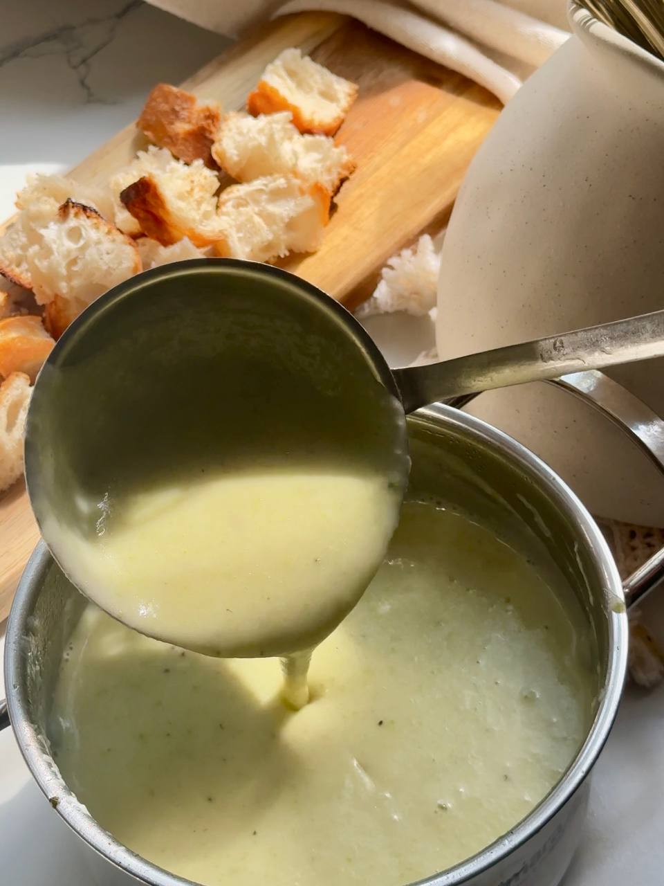 showing the smooth texture of cream cheese zucchini soup