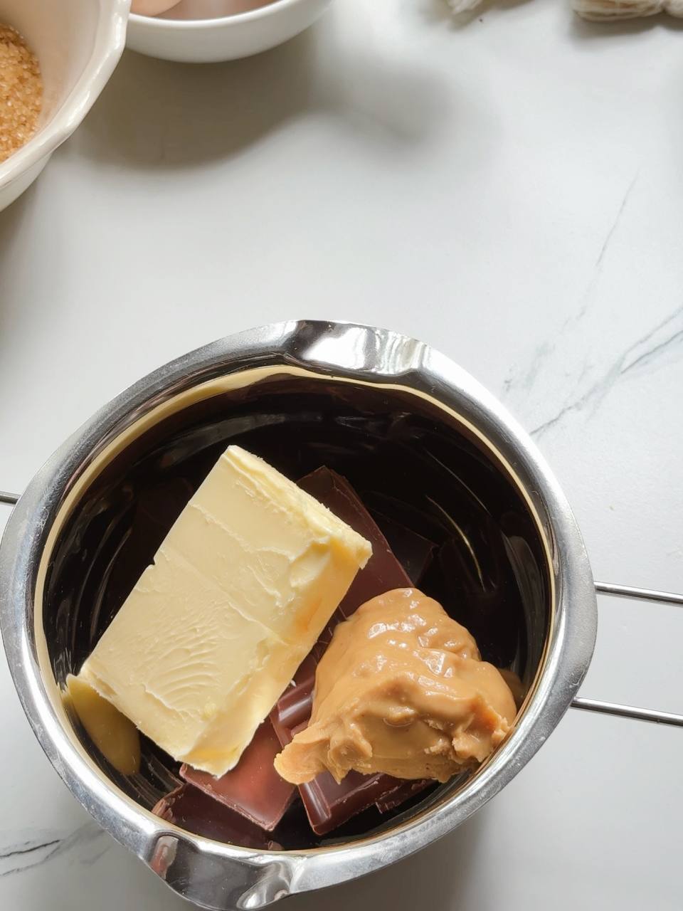 dark chocolate, butter, and peanut butter before melting