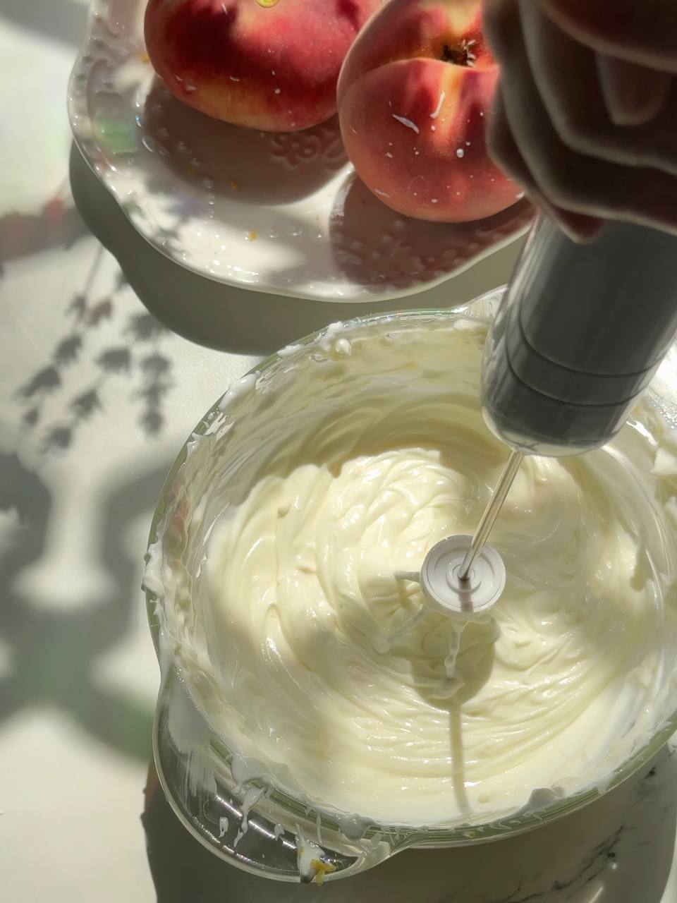 mixing the cheesecake filling until smooth and creamy