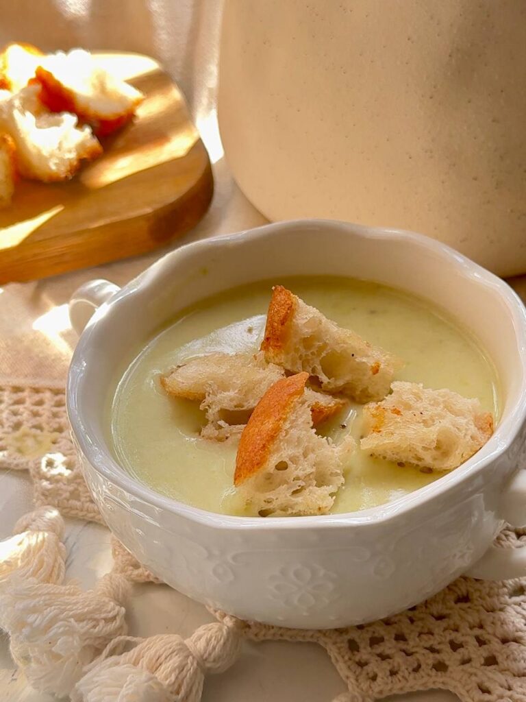 cream cheese zucchini soup served with homemade garlic croutons