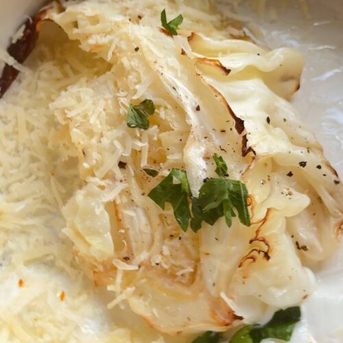 roasted cabbage steaks with Parmesan topped with fresh parsley