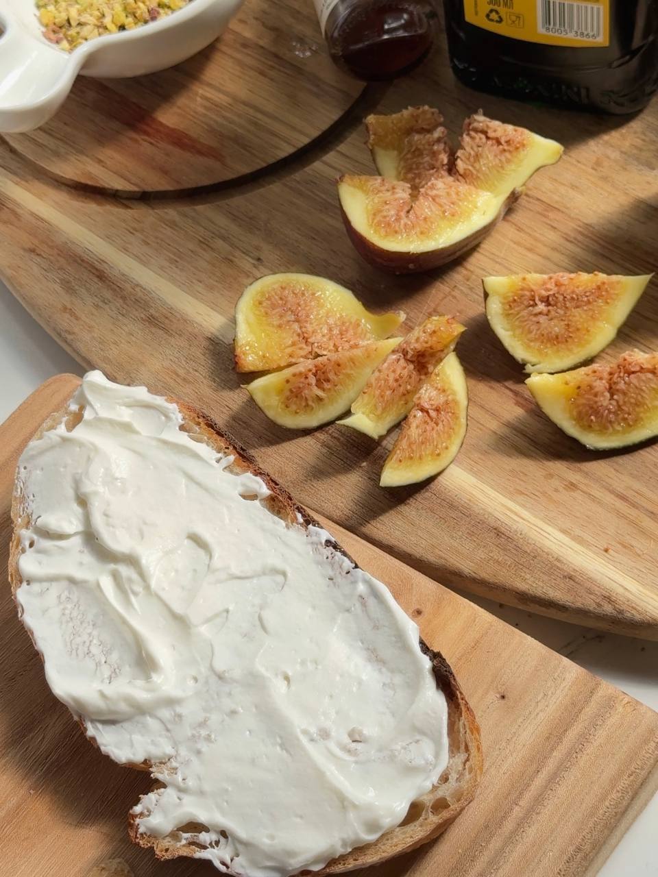 spreading the creamy cottage cheese mixture onto toasted bread