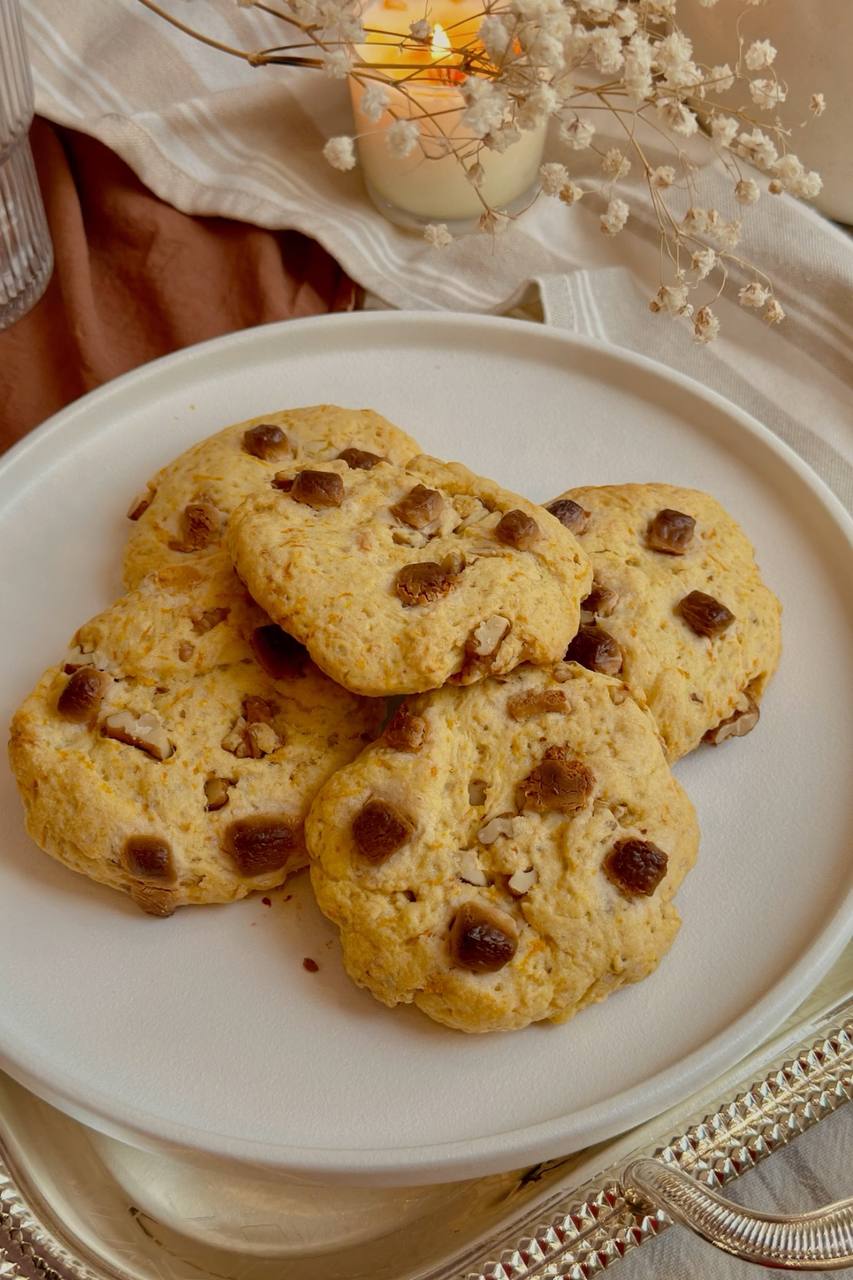 Homemade carrot cake cookies with walnuts and white chocolate served on a plate