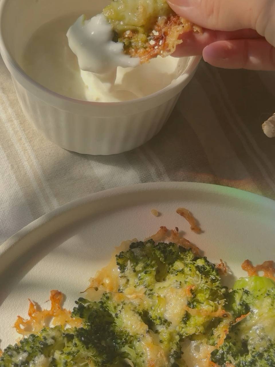 Crispy garlic Parmesan broccoli dipped in Greek yogurt.